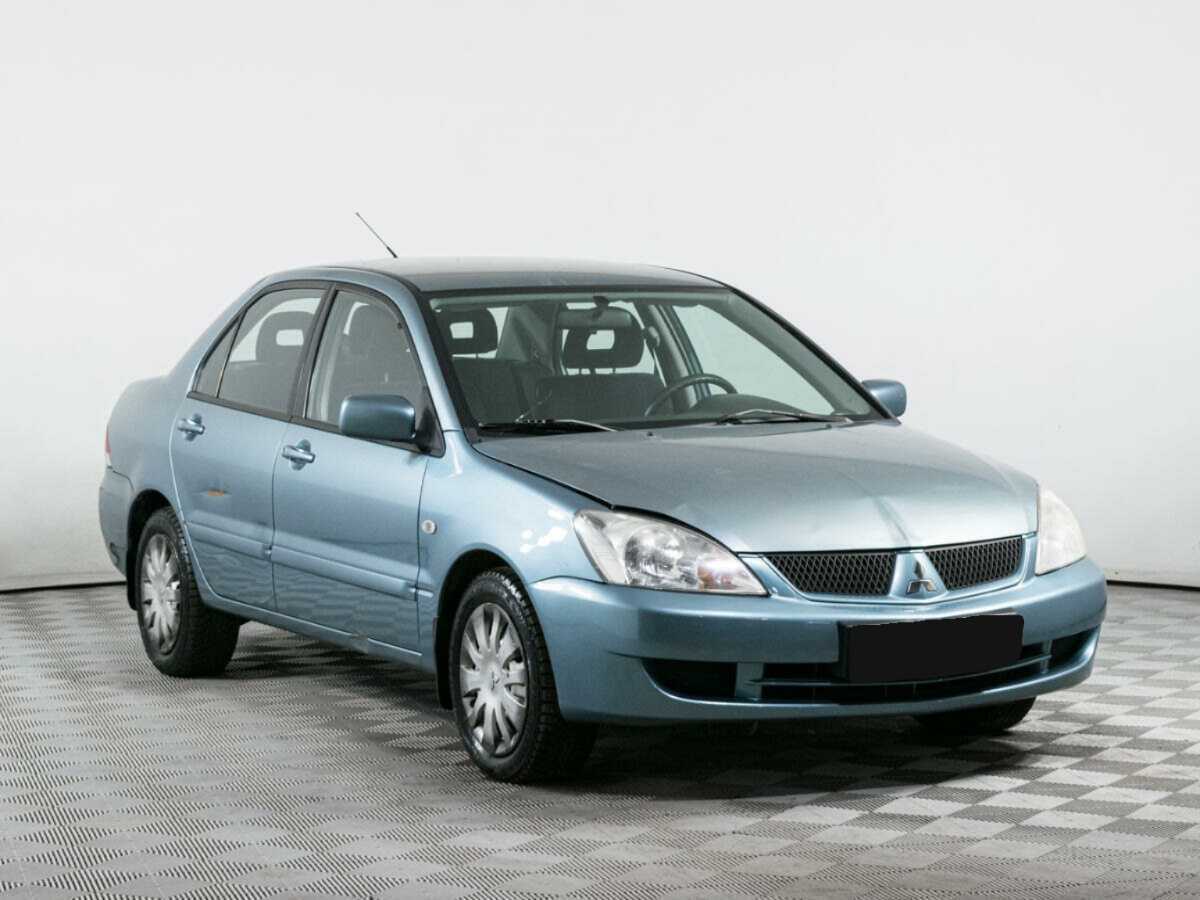 Купить Mitsubishi Lancer с пробегом. Фото: #2