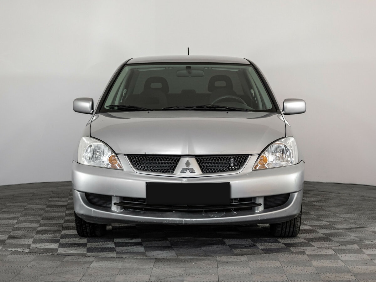 Купить Mitsubishi Lancer с пробегом. Фото: #1