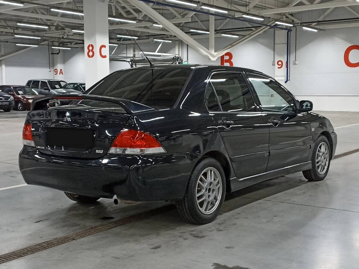 Купить Mitsubishi Lancer с пробегом. Фото: #4