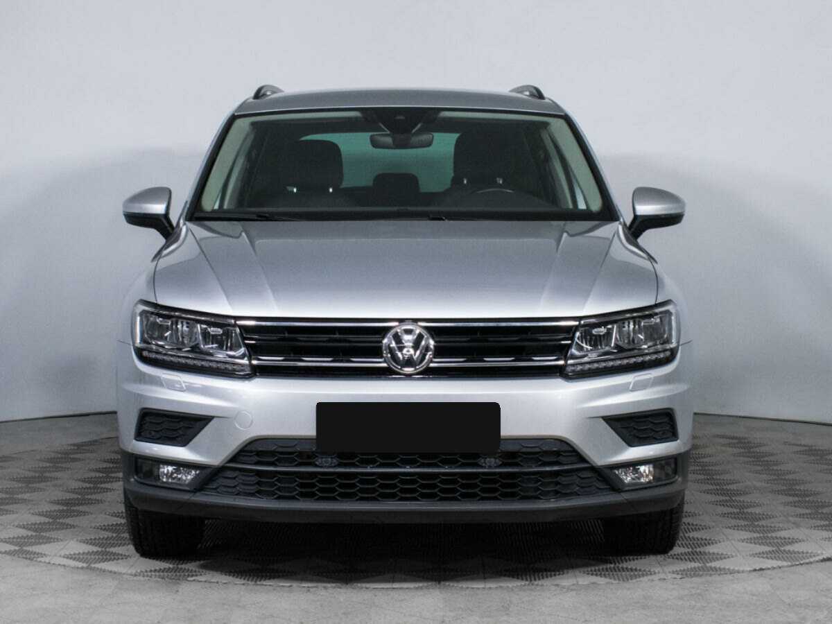 Купить Volkswagen Tiguan с пробегом. Посмотреть фото