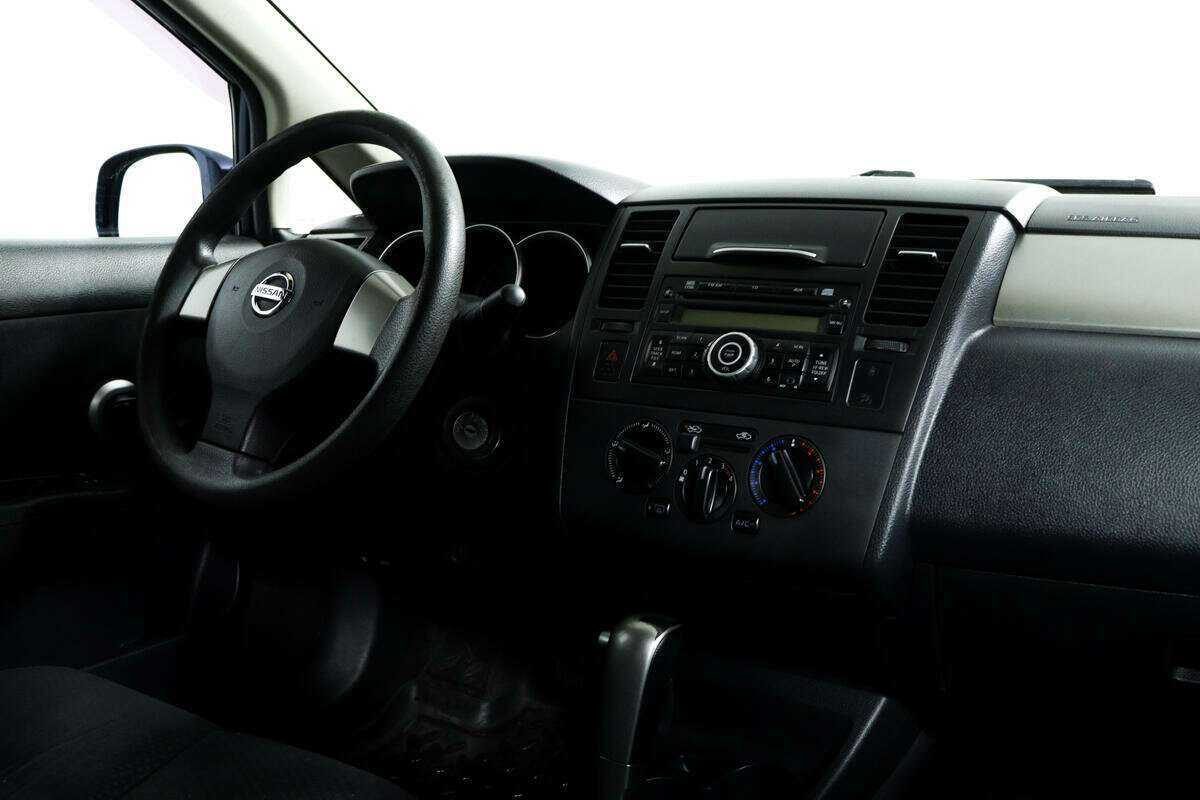 Купить Nissan Tiida с пробегом. Фото: #8