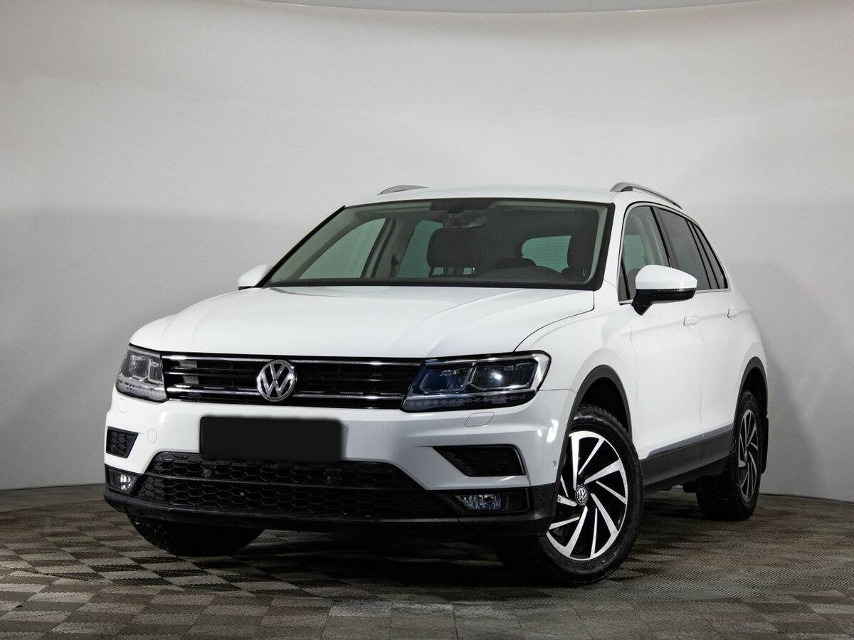 Купить Volkswagen Tiguan с пробегом. Посмотреть фото