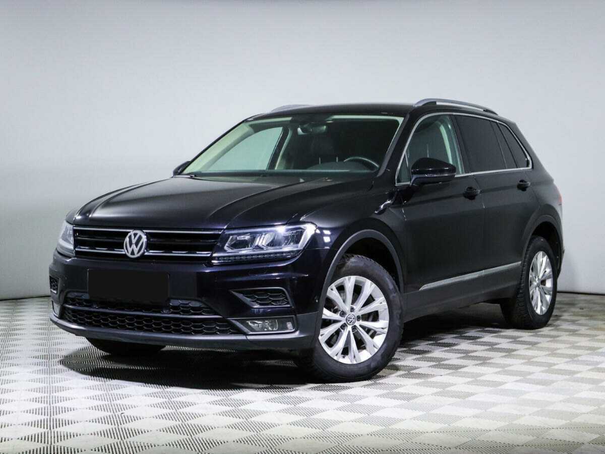 Купить Volkswagen Tiguan с пробегом. Посмотреть фото