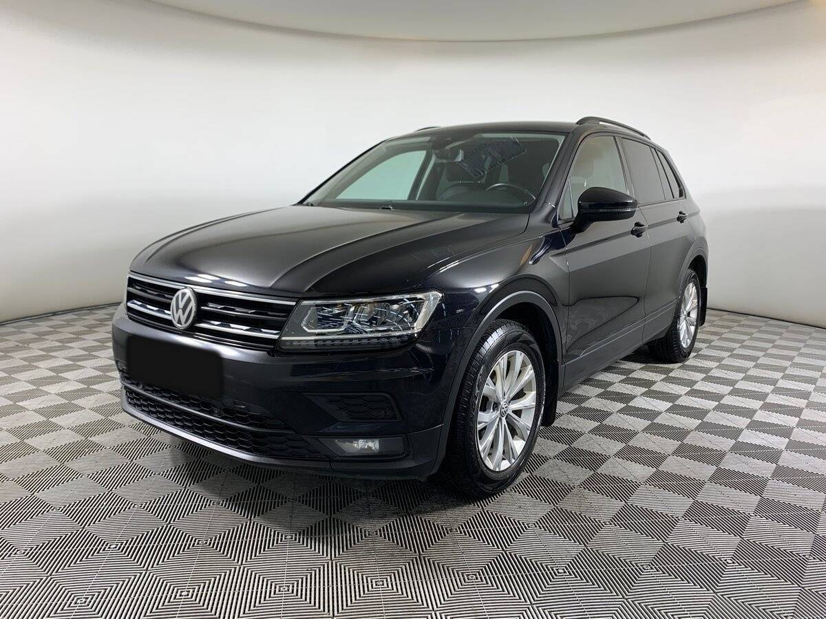 Купить Volkswagen Tiguan с пробегом. Посмотреть фото