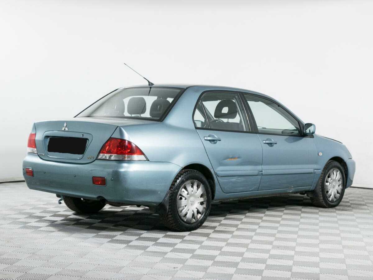 Купить Mitsubishi Lancer с пробегом. Фото: #4