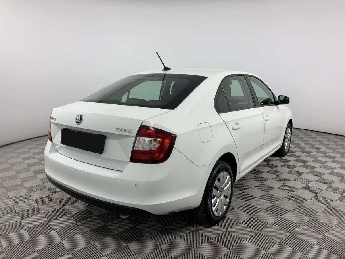 Купить Skoda Rapid с пробегом. Фото: #4