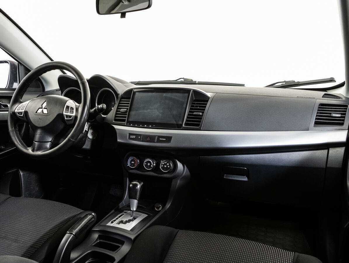 Купить Mitsubishi Lancer с пробегом. Фото: #8