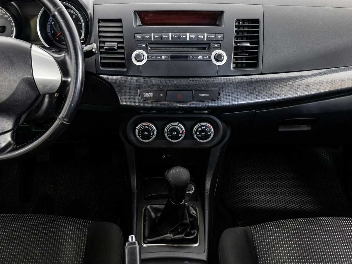 Купить Mitsubishi Lancer с пробегом. Фото: #8