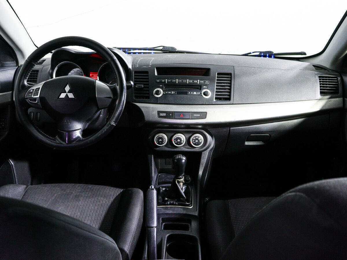 Купить Mitsubishi Lancer с пробегом. Фото: #9