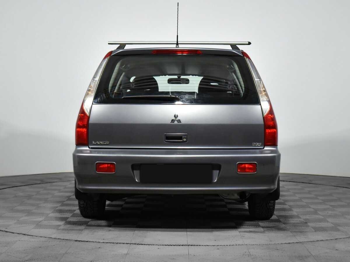 Купить Mitsubishi Lancer с пробегом. Фото: #4