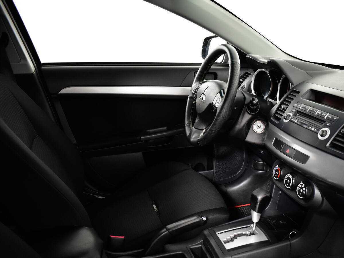 Купить Mitsubishi Lancer с пробегом. Фото: #5