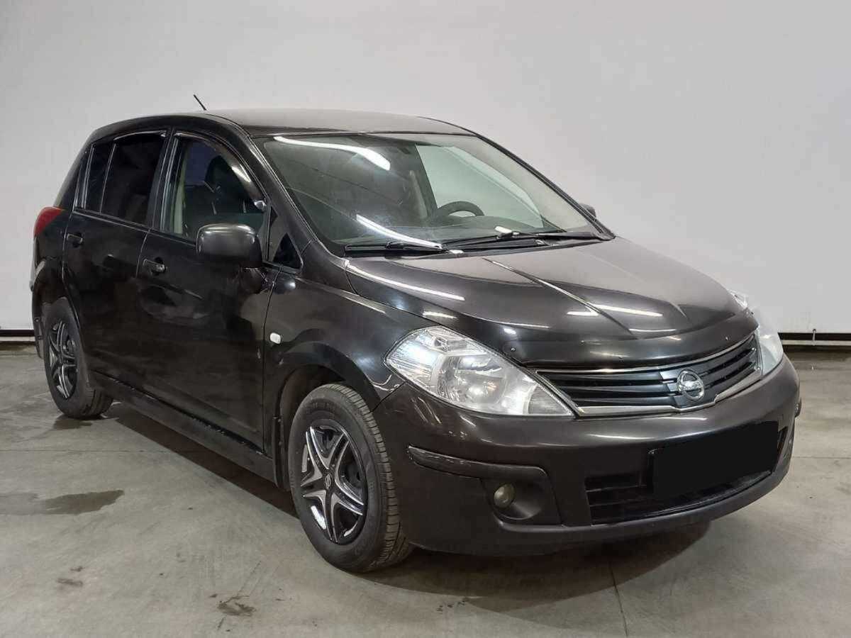 Купить Nissan Tiida с пробегом. Фото: #2