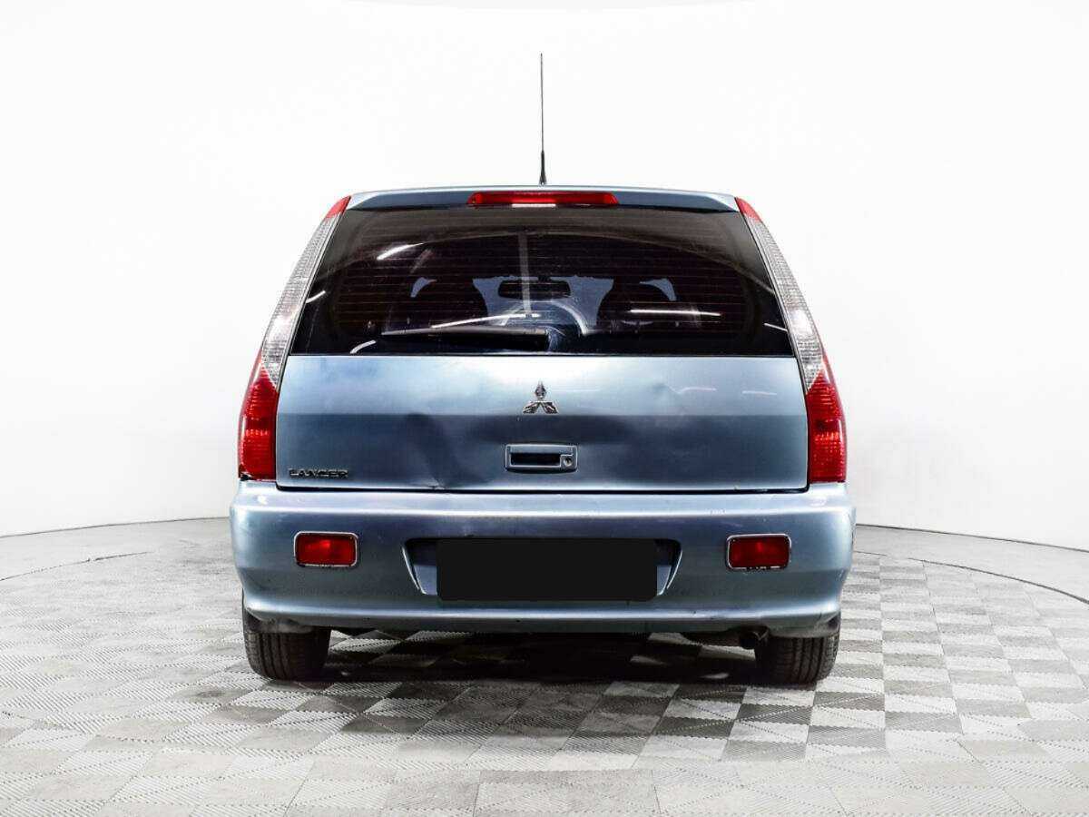 Купить Mitsubishi Lancer с пробегом. Фото: #5