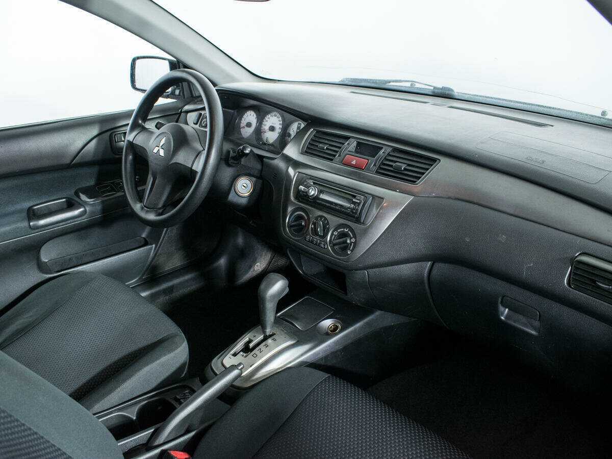 Купить Mitsubishi Lancer с пробегом. Фото: #8