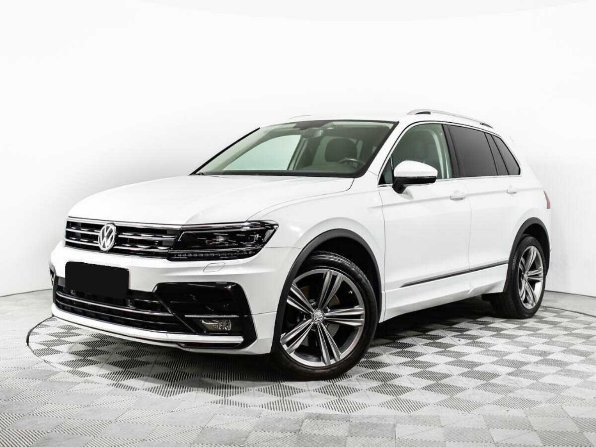 Купить Volkswagen Tiguan с пробегом. Посмотреть фото