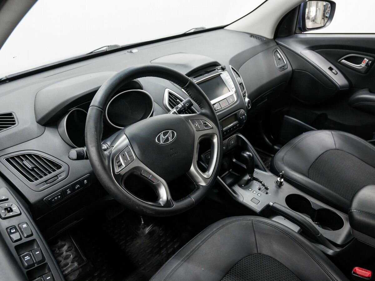 Купить Hyundai ix35 с пробегом. Фото: #11