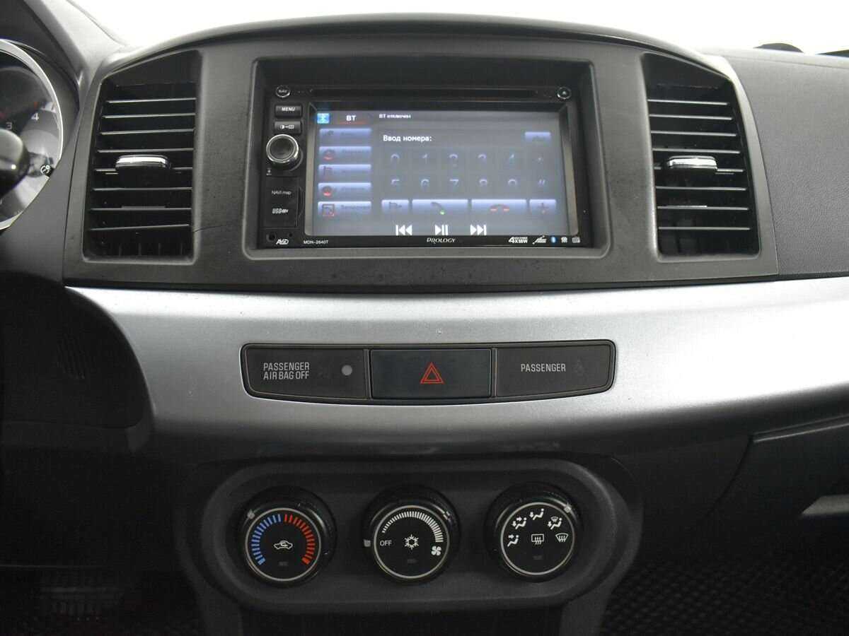 Купить Mitsubishi Lancer с пробегом. Фото: #12