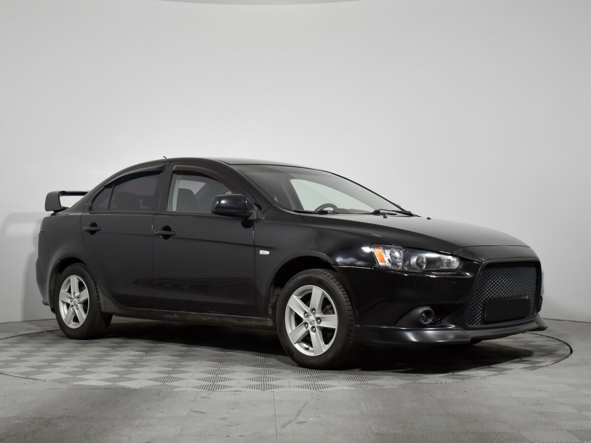 Купить Mitsubishi Lancer с пробегом. Фото: #2
