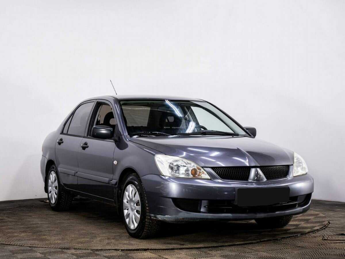 Купить Mitsubishi Lancer с пробегом. Фото: #2