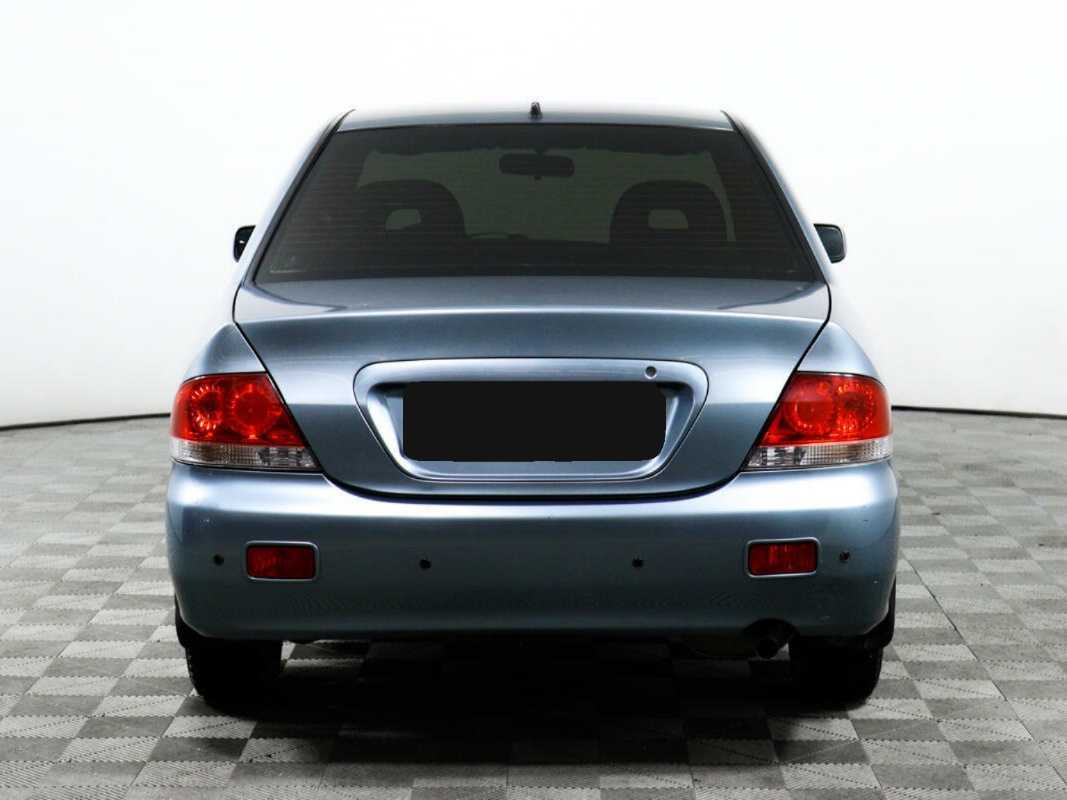 Купить Mitsubishi Lancer с пробегом. Фото: #5