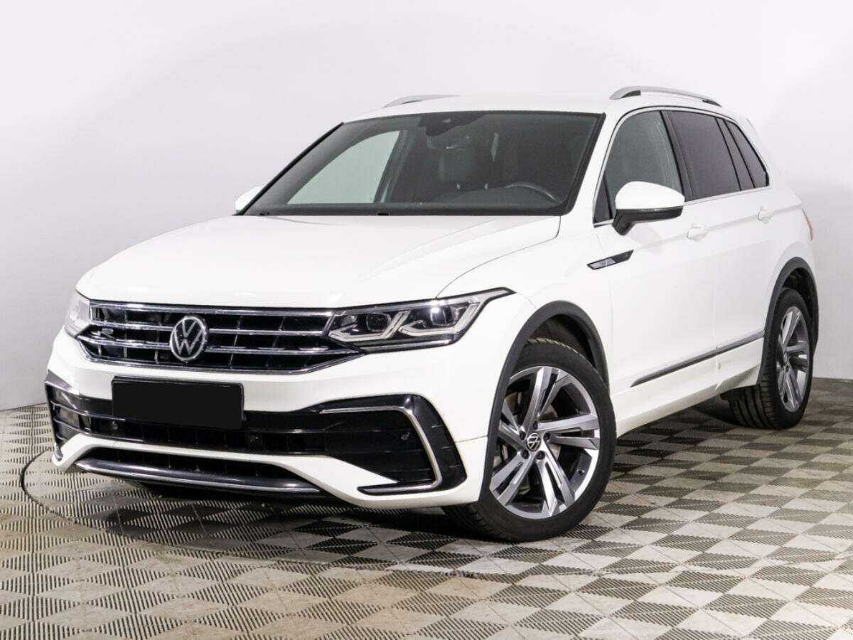 Купить Volkswagen Tiguan с пробегом. Посмотреть фото