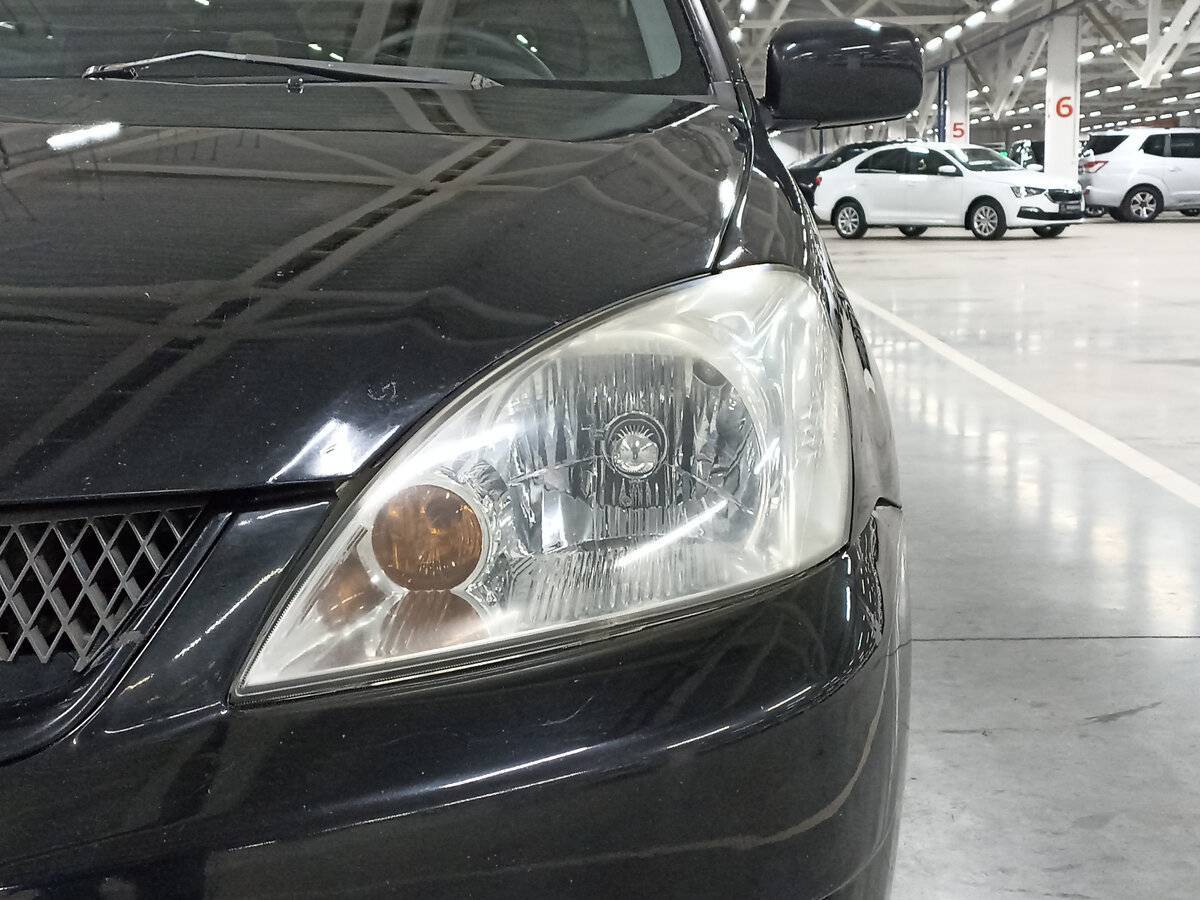 Купить Mitsubishi Lancer с пробегом. Фото: #16