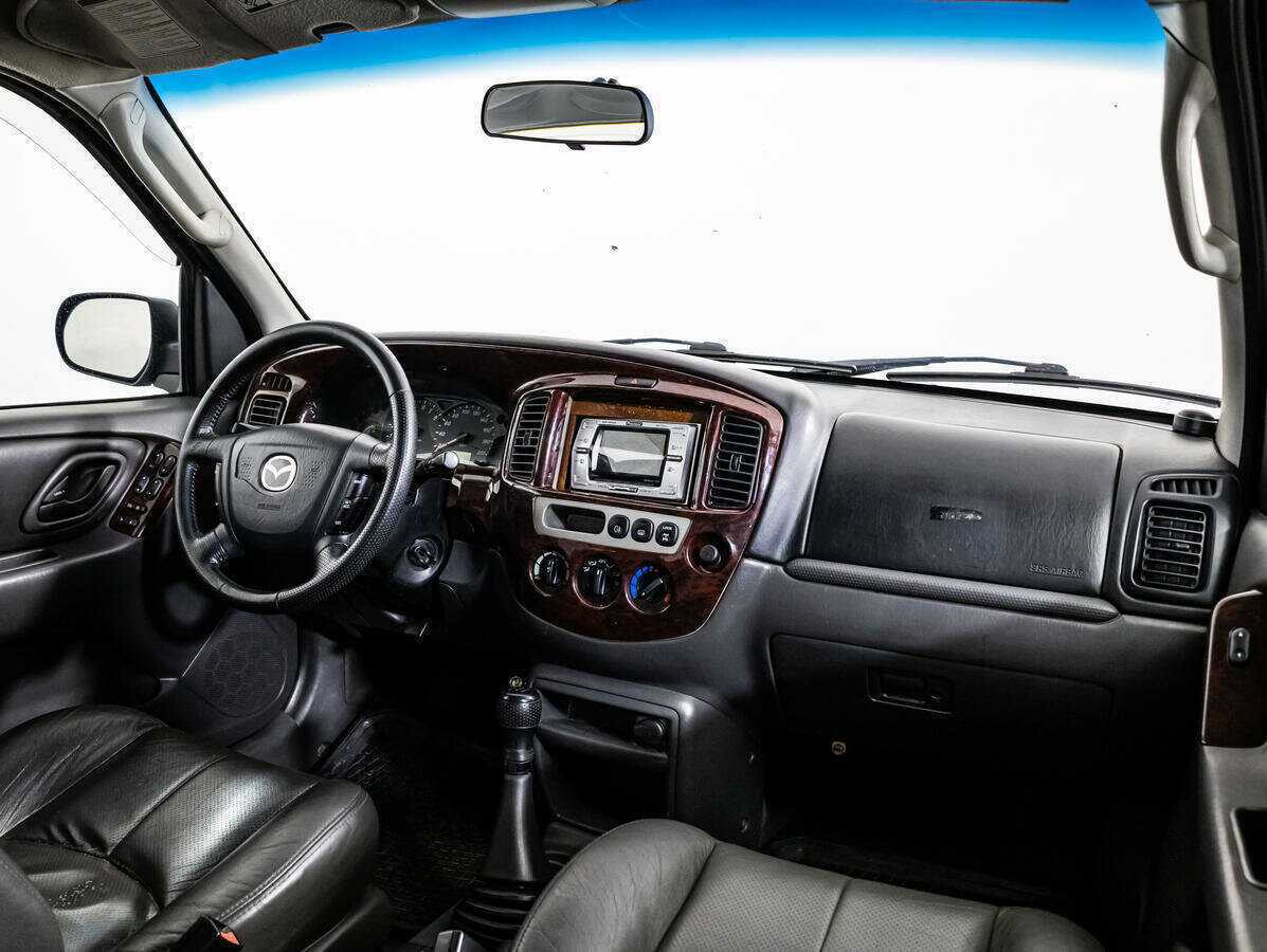 Купить Mazda Tribute с пробегом. Фото: #6