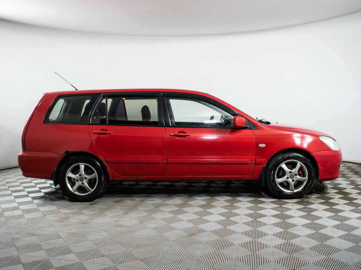 Купить Mitsubishi Lancer с пробегом. Фото: #3