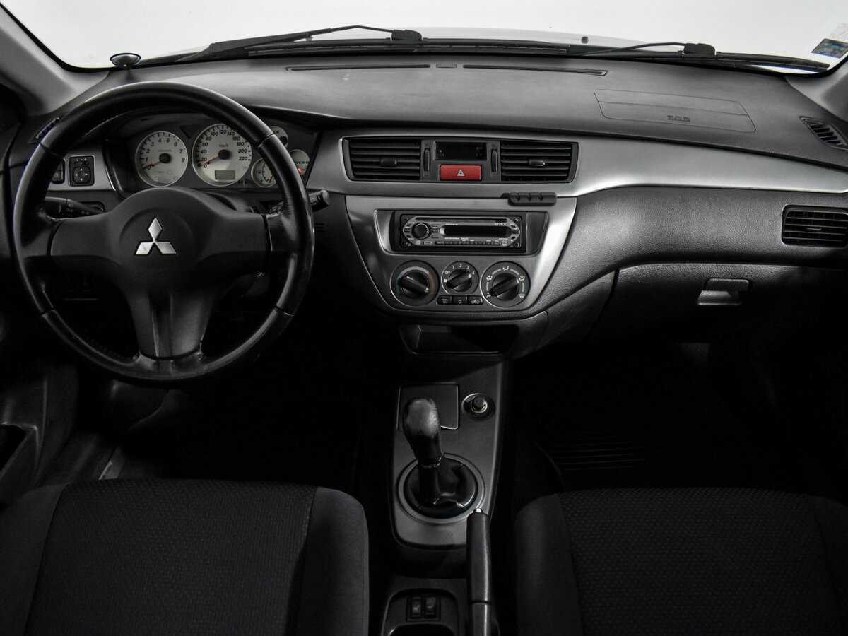Купить Mitsubishi Lancer с пробегом. Фото: #9