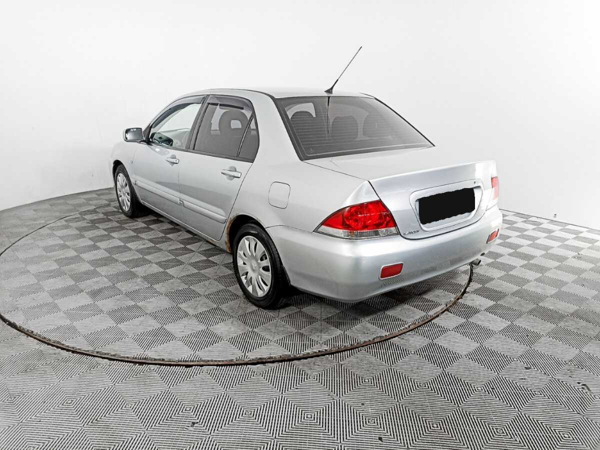 Купить Mitsubishi Lancer с пробегом. Фото: #6