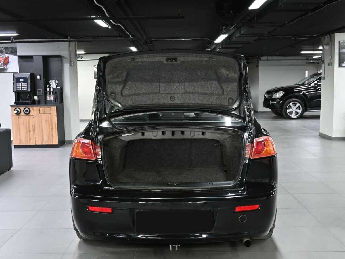 Купить Mitsubishi Lancer с пробегом. Фото: #4