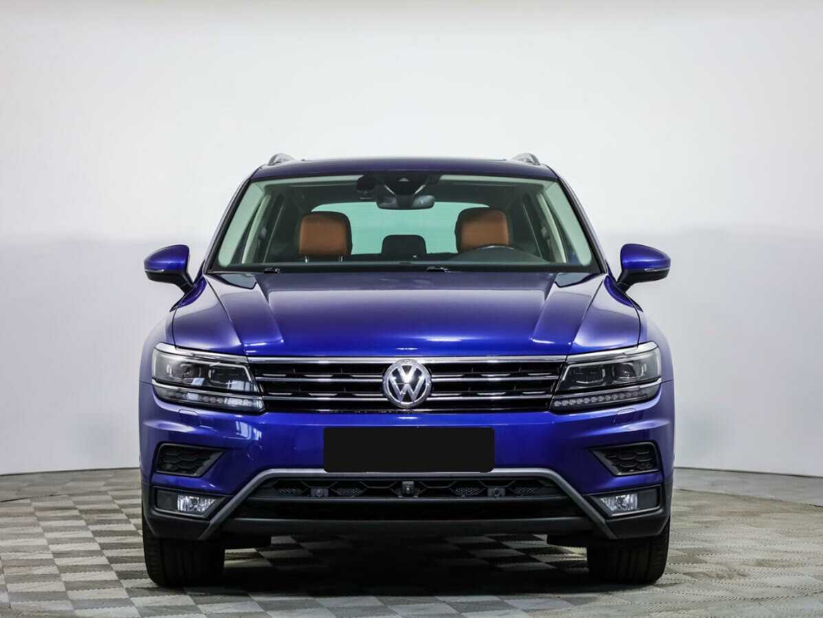 Купить Volkswagen Tiguan с пробегом. Посмотреть фото