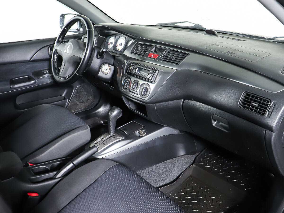 Купить Mitsubishi Lancer с пробегом. Фото: #8
