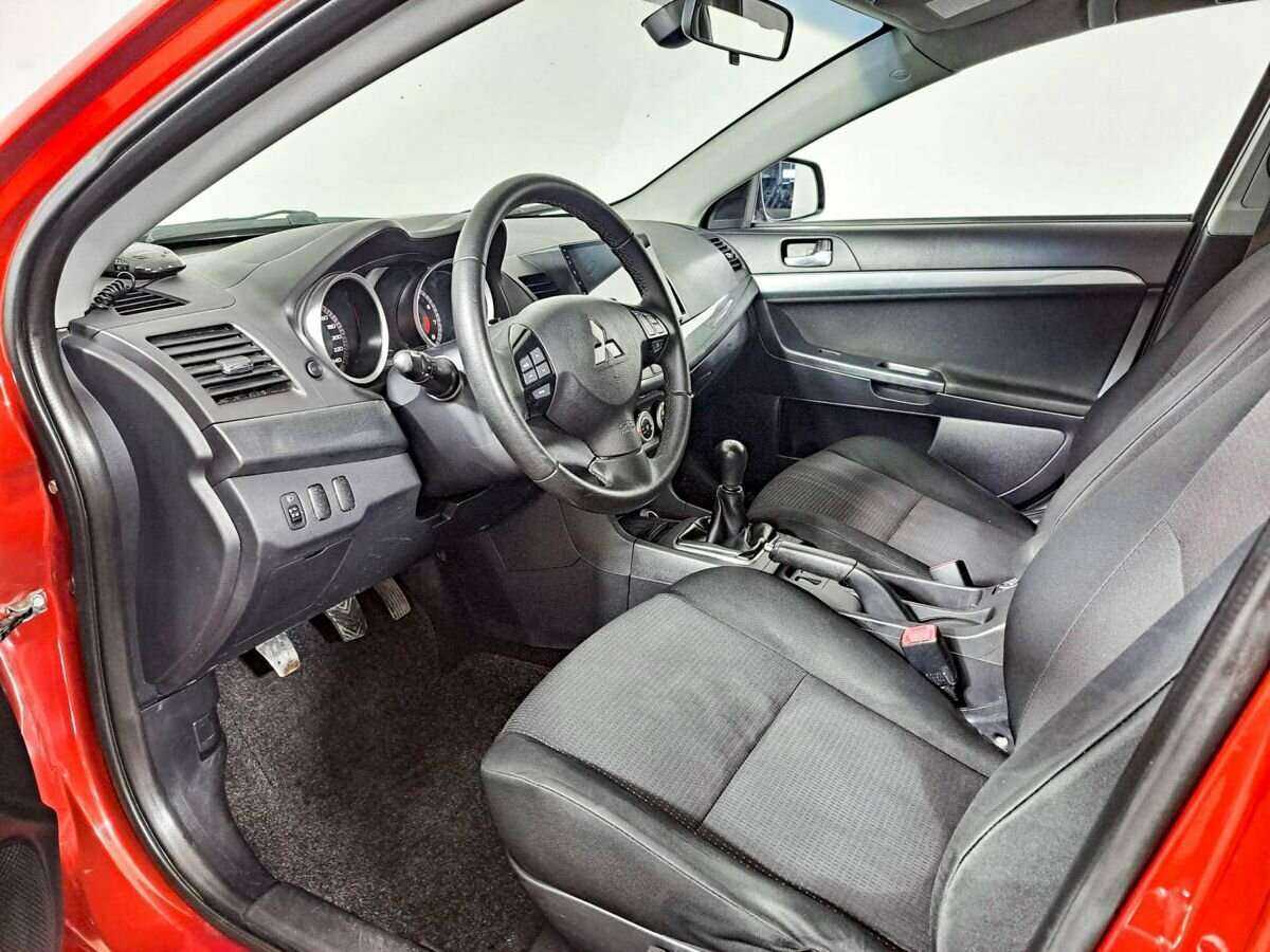 Купить Mitsubishi Lancer с пробегом. Фото: #11