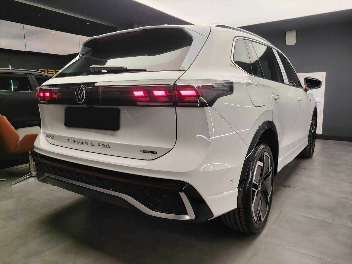 Купить Volkswagen Tiguan с пробегом. Фото: #3