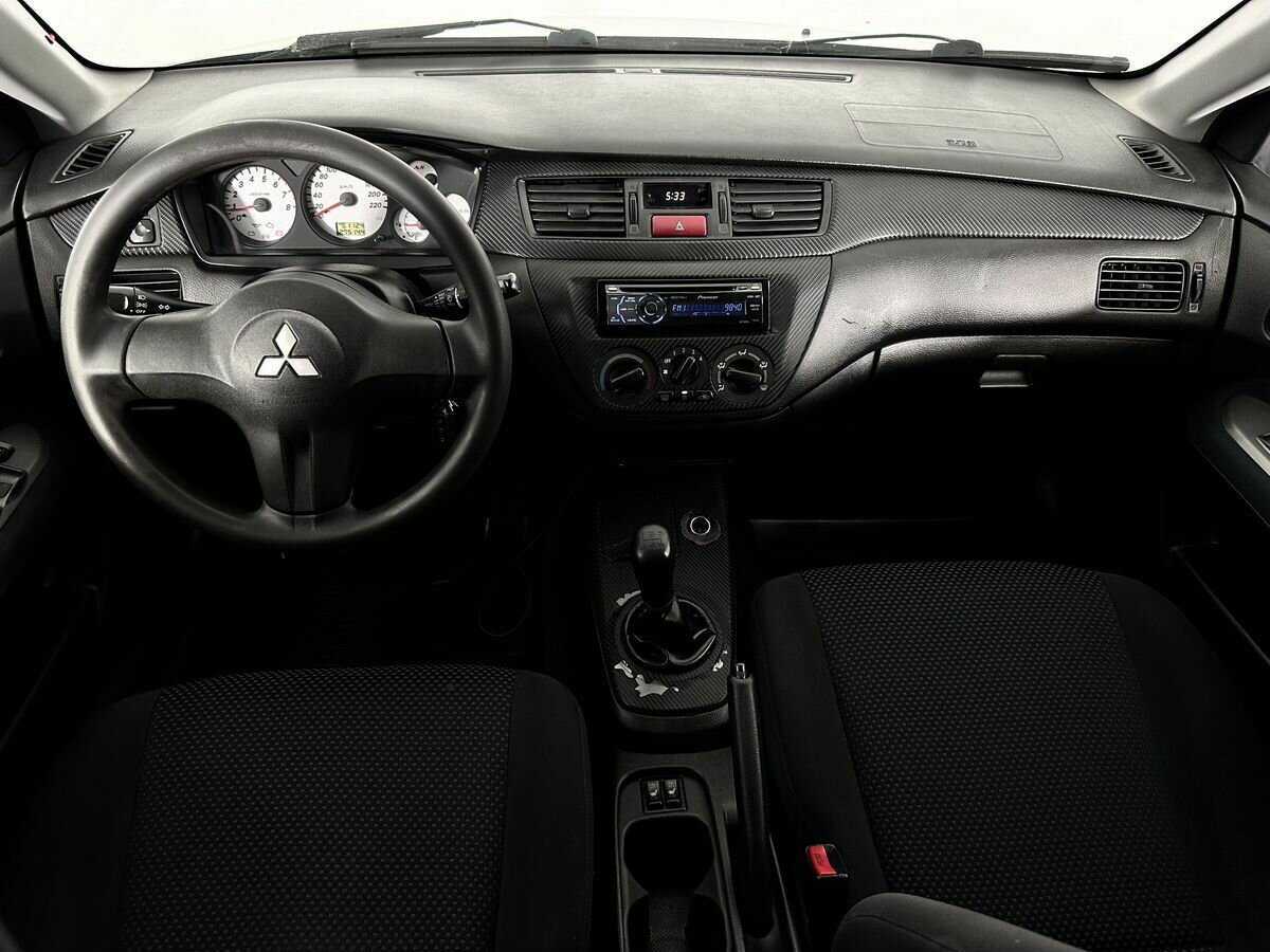 Купить Mitsubishi Lancer с пробегом. Фото: #6
