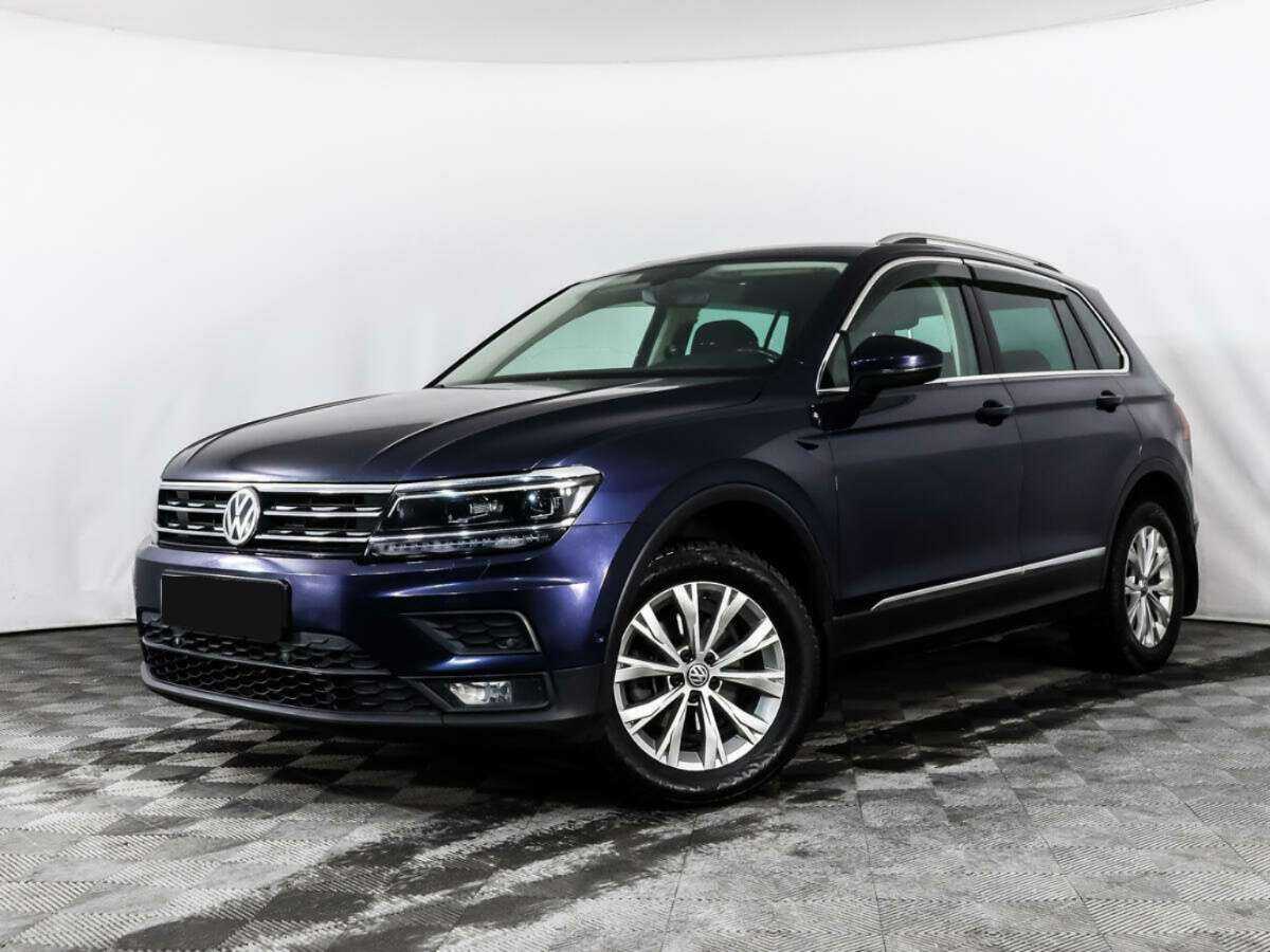 Купить Volkswagen Tiguan с пробегом. Посмотреть фото