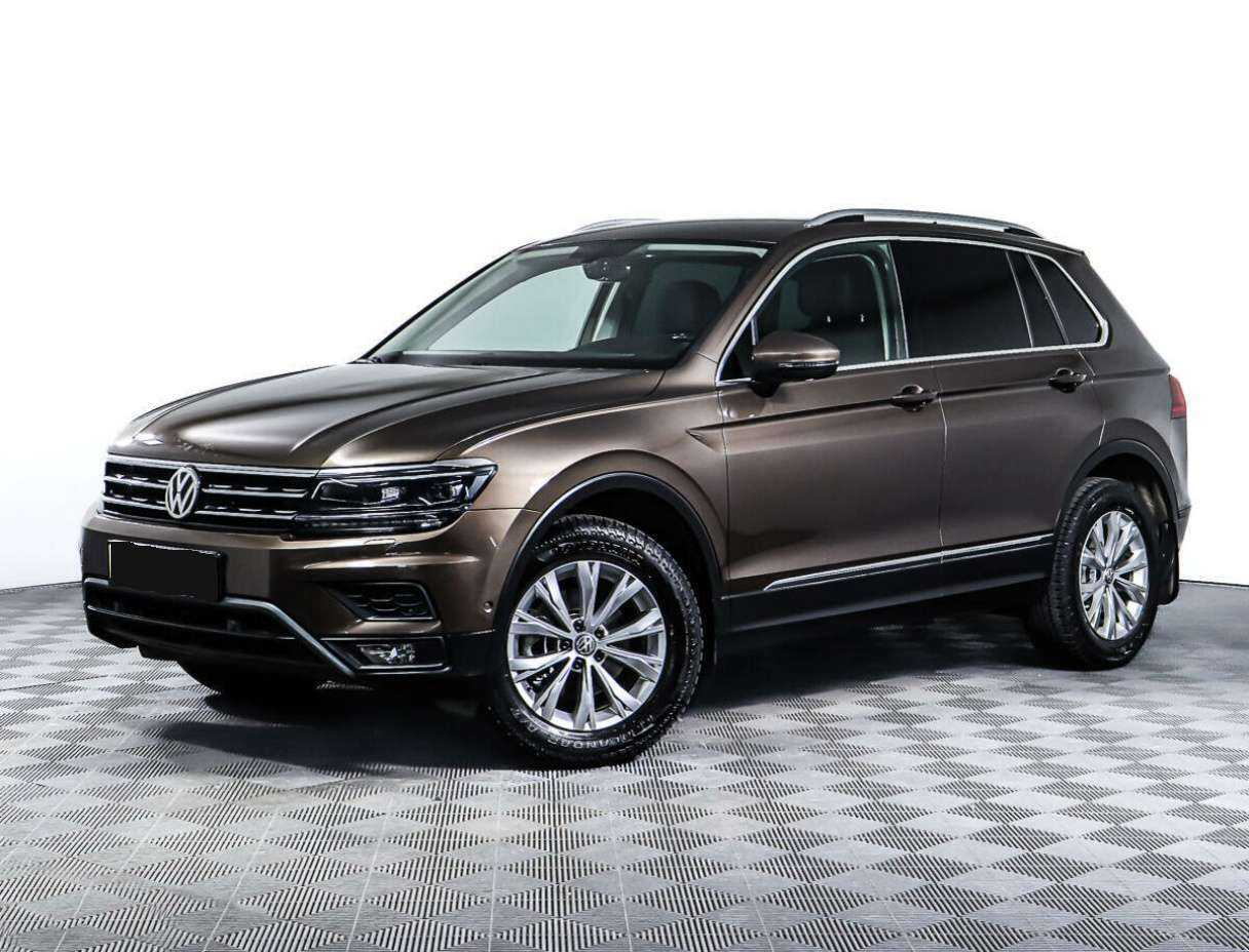 Купить Volkswagen Tiguan с пробегом. Посмотреть фото