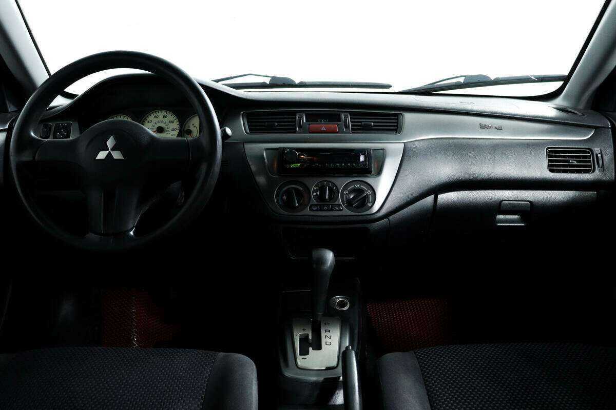 Купить Mitsubishi Lancer с пробегом. Фото: #10