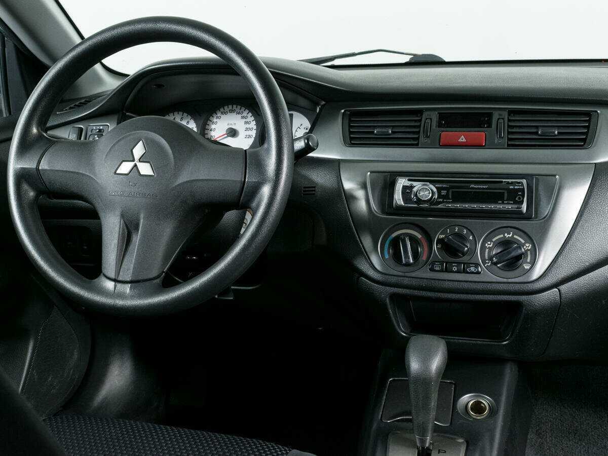 Купить Mitsubishi Lancer с пробегом. Фото: #10