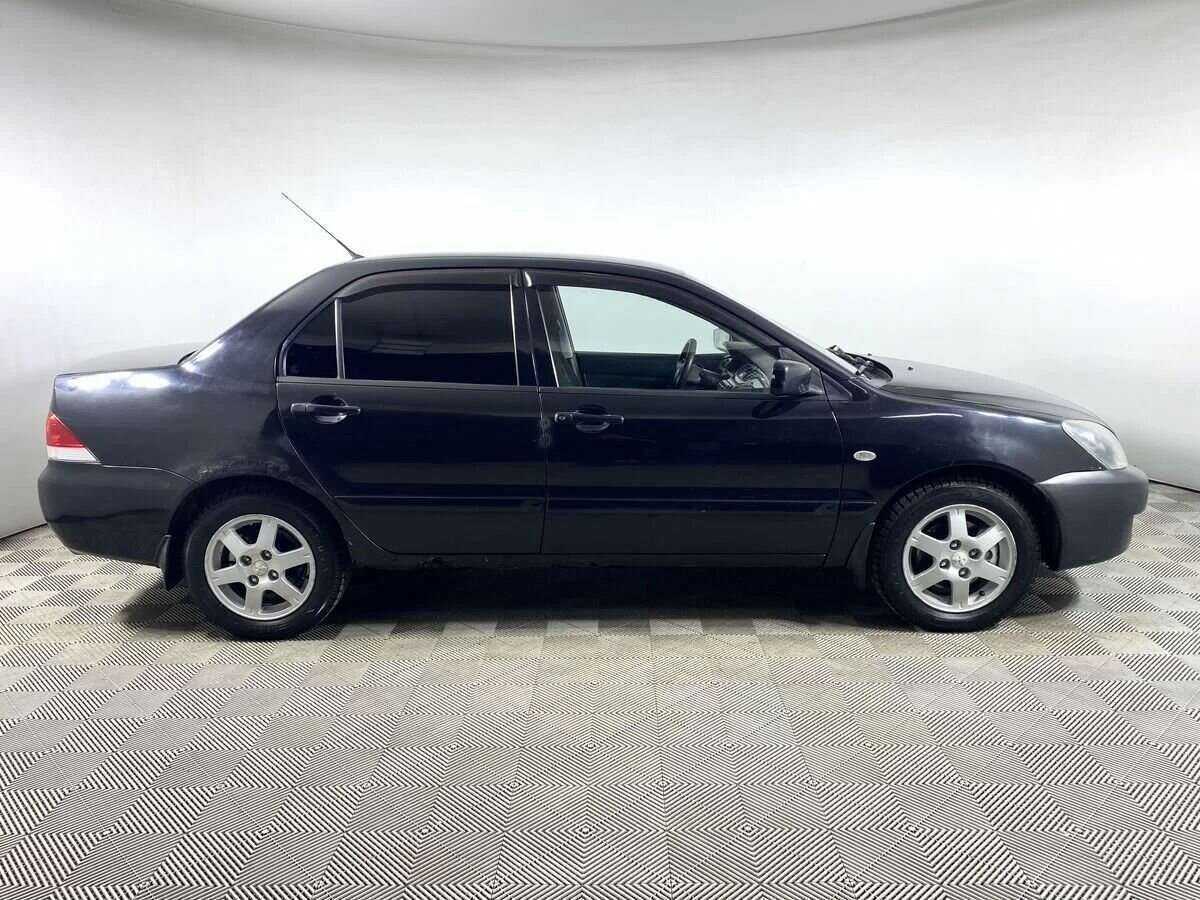 Купить Mitsubishi Lancer с пробегом. Фото: #3