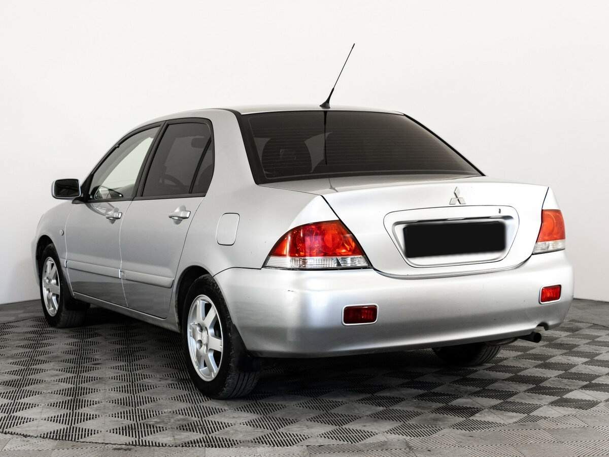 Купить Mitsubishi Lancer с пробегом. Фото: #6
