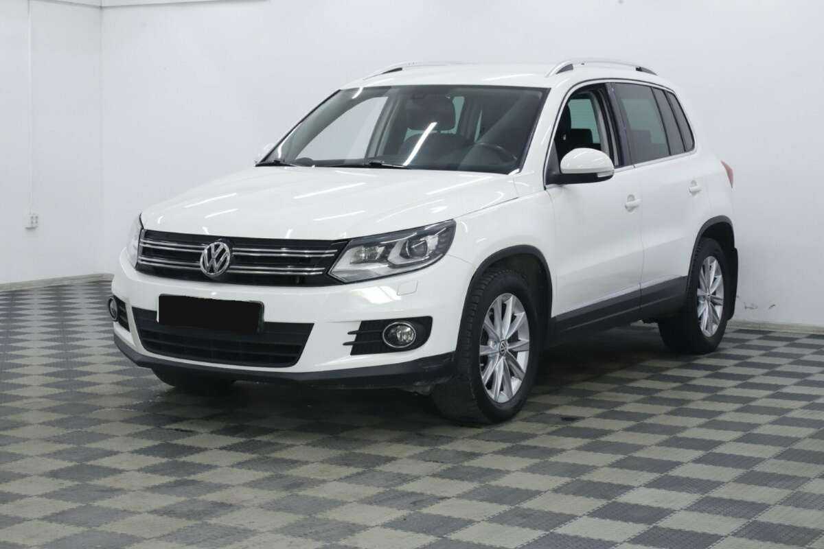 Купить Volkswagen Tiguan с пробегом. Посмотреть фото