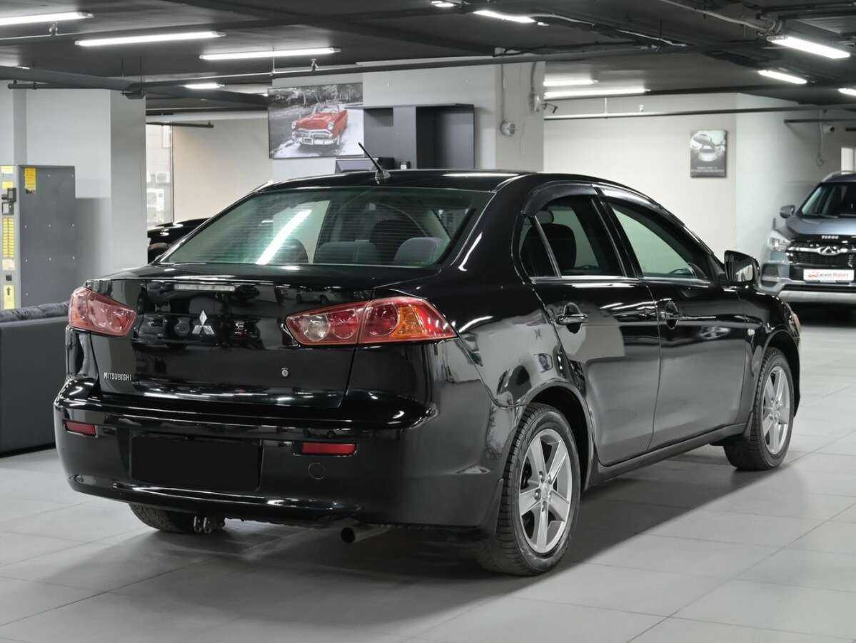 Купить Mitsubishi Lancer с пробегом. Фото: #1