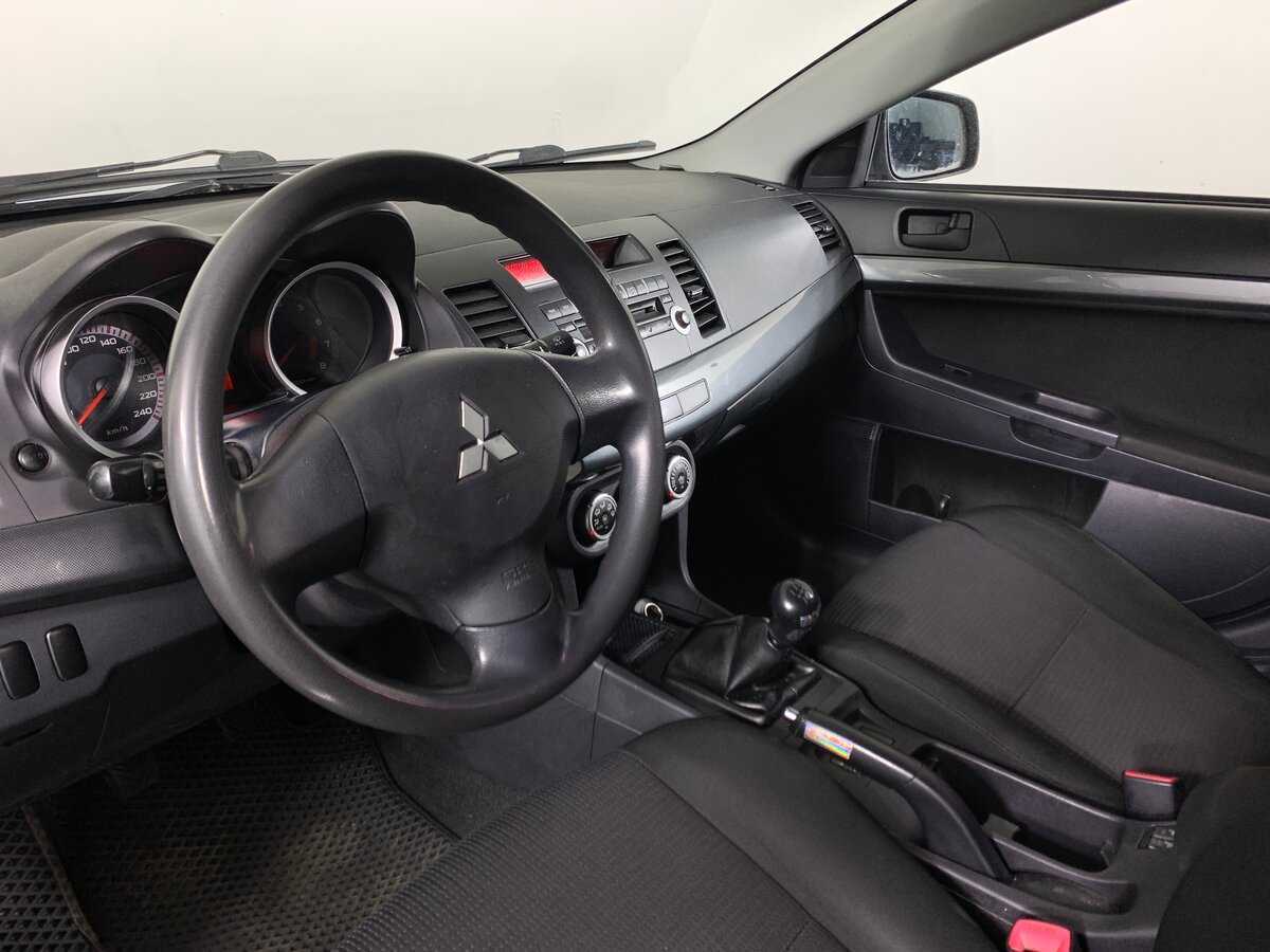 Купить Mitsubishi Lancer с пробегом. Фото: #11