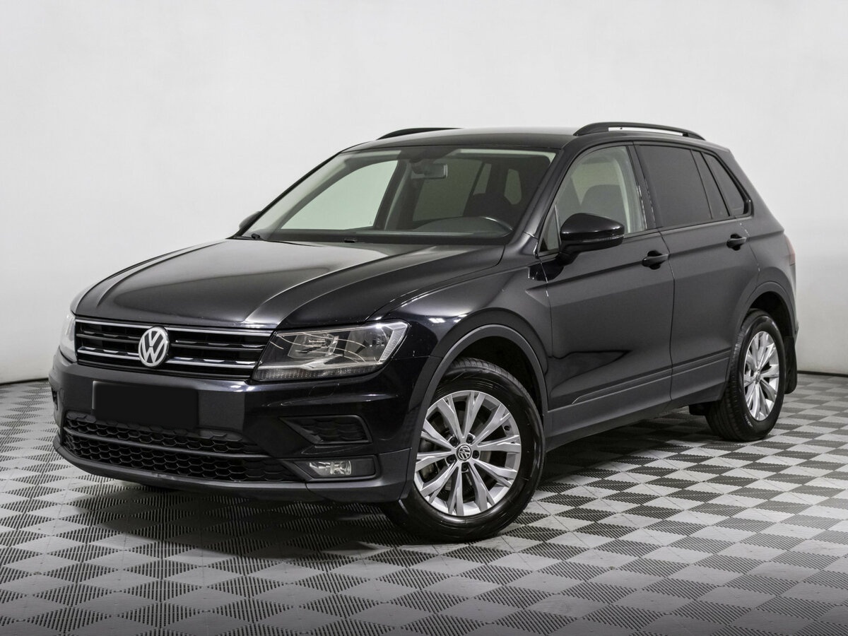 Купить Volkswagen Tiguan с пробегом. Посмотреть фото