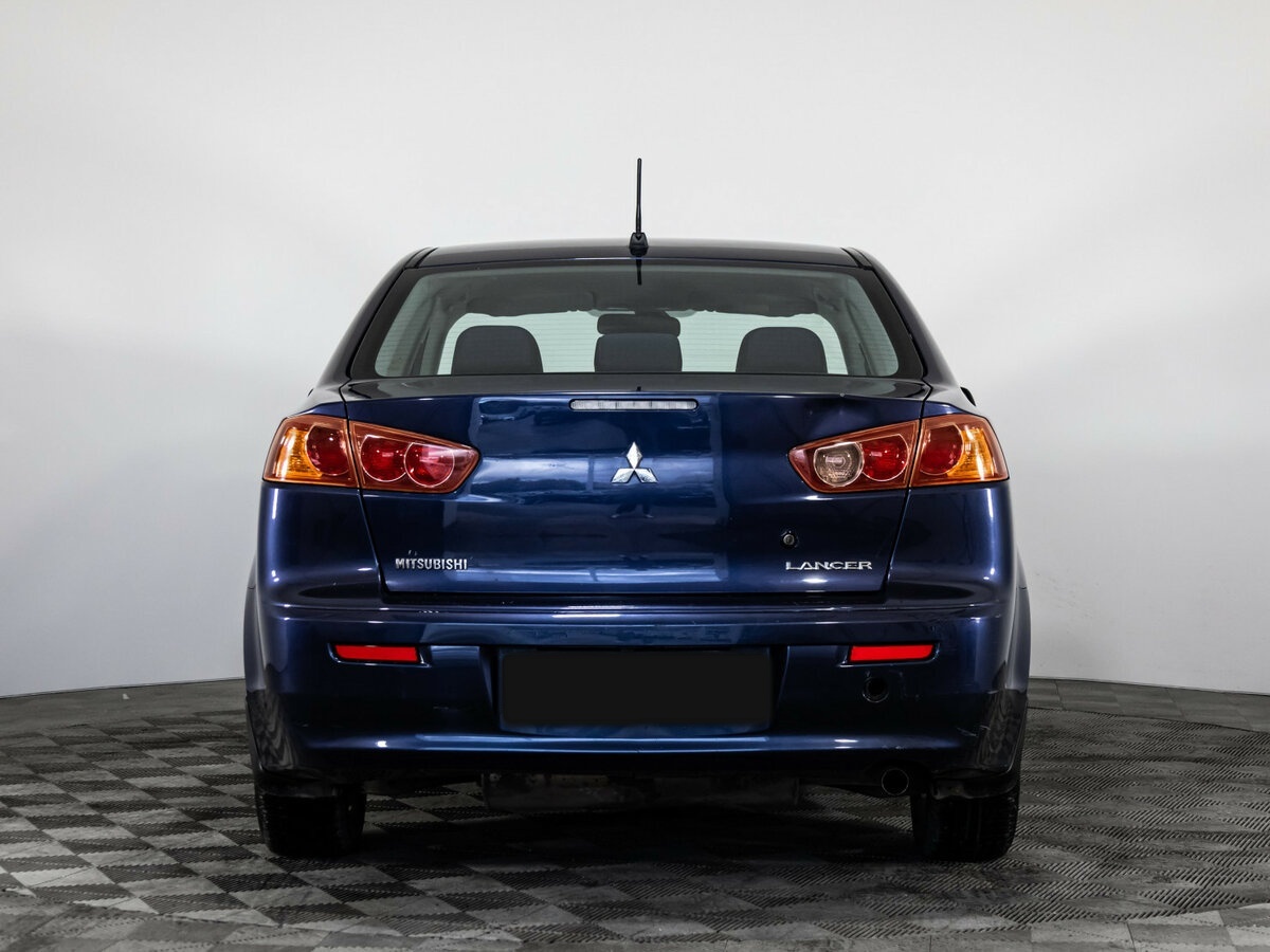 Купить Mitsubishi Lancer с пробегом. Фото: #4