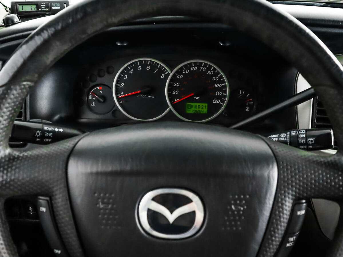 Купить Mazda Tribute с пробегом. Фото: #15