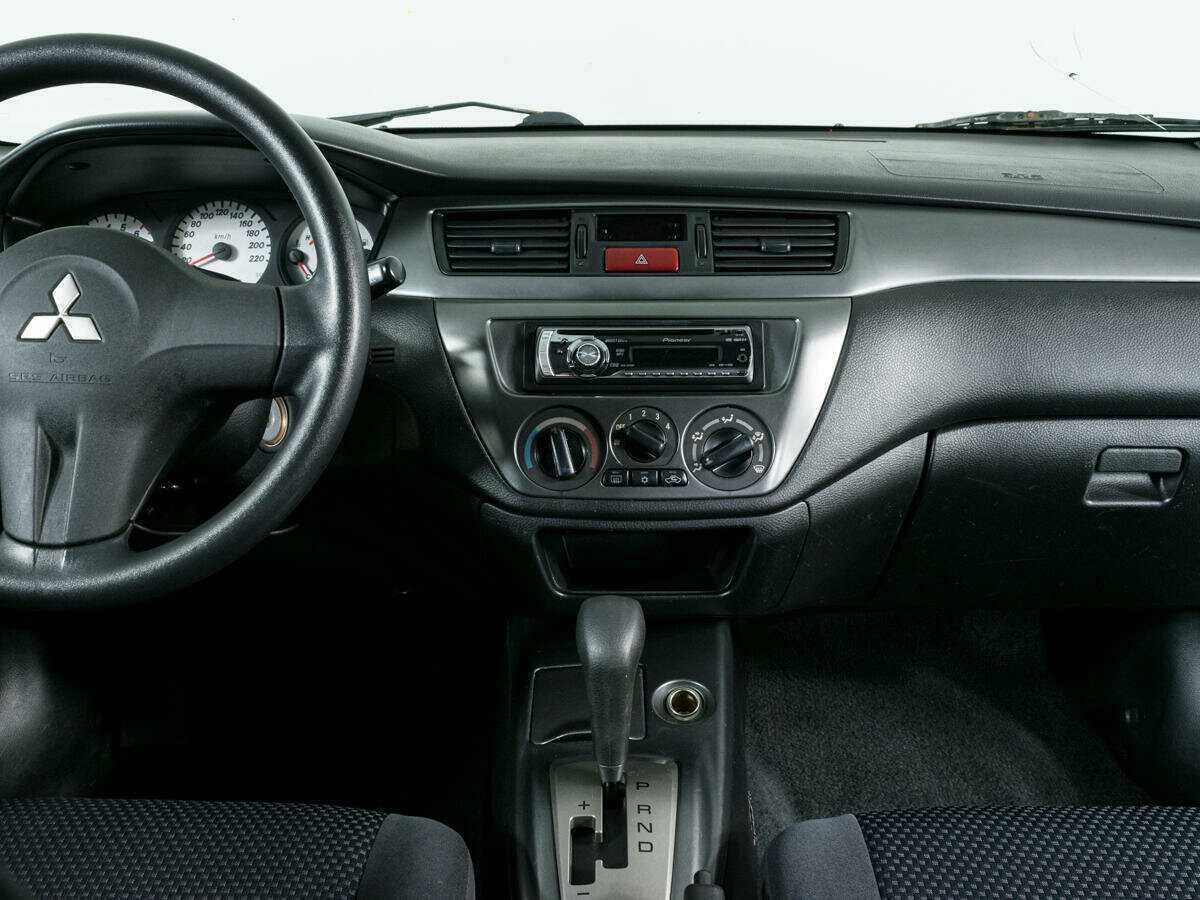 Купить Mitsubishi Lancer с пробегом. Фото: #9