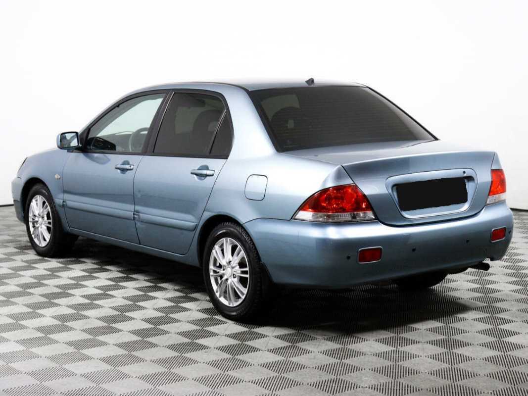 Купить Mitsubishi Lancer с пробегом. Фото: #6